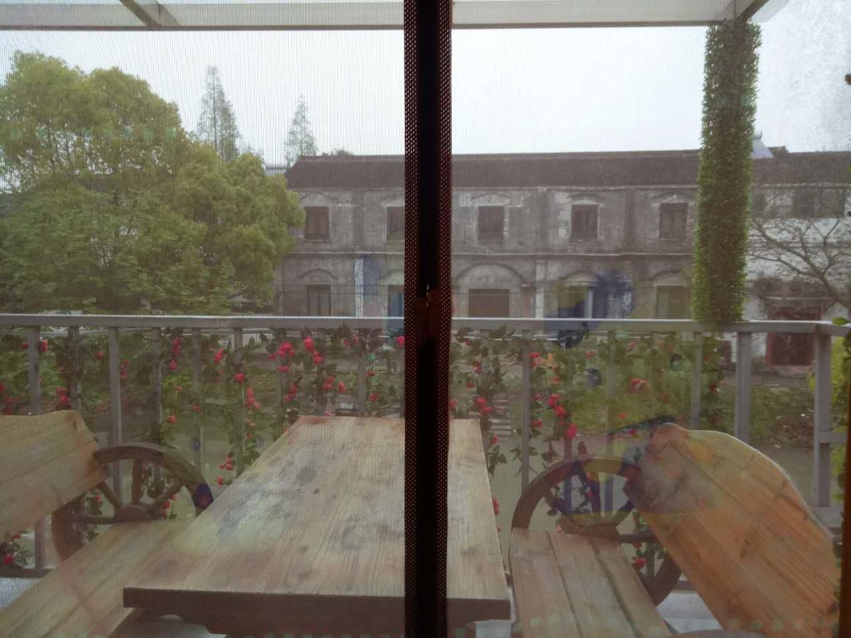 Wuzhen Helan Bridge Inn Tongxiang Exteriör bild